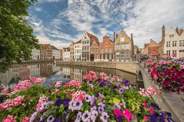 Fototapeten Bruges Belgium, city skyline at Spiegelrei Canal with summer flower © Noppasinw