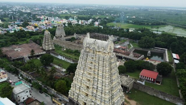 A majestic aerial view of Sri Kanchi Kamakshi Amman Temple Kanchipuram city in Tamil Nadu. Pull back shot of the magnificent Architecture of Kamakshi Amman Temple.