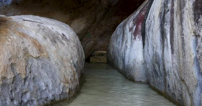 Virgin Gorda Caribbean ocean Baths rocks cave. Commonwealth of the United Kingdom, British Virgin Islands. Cruise ship vacation destination. Geologic formation, the Baths tourist destinations. Resort.