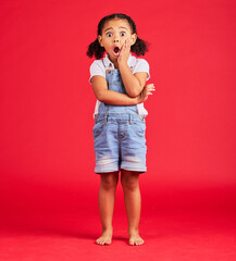 Little girl, portrait or shocked hand on face, isolated or red background and kids gossip, bad news...