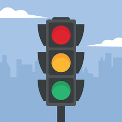 Traffic light on the background of the city and the blue sky