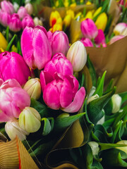 Set of bouquets of tulips of different colors, tulips bouquet. Present for March 8, International Women's Day. Holiday decor with flowers selling. Bouquet with colorful tulips. Holiday floral decor