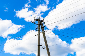 Power electric pole with line wire on colored background close up