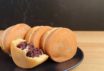 Japanese Traditional Dessert Called Imagawayaki or Obanyaki, a Tasty Azuki Red Bean Paste Filled Pan Cake