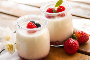 dairy dessert - yogurt with fresh strawberries in a glass