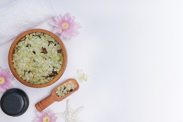 Mix of different salt types in a bowl. Sea salts, pink Himalayan. Spa product for female body, foot, hand spa, massage and candles, Relaxation. Flat lay. top view.