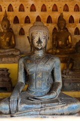 Fototapeta premium Antique statue of buddha in Si Saket temple at Vientiane-Laos