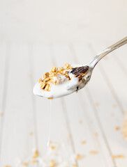 Background spoon with granola