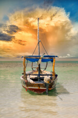 travelling Africa Kenya and Zanzibar seascape with crystal clear turquoise water and traditional...