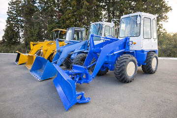 Image of wheel loaders lined up from a high angle