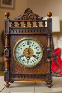 antique clock inside the home with soft focused background