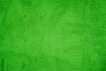 A green colored old cement wall texture background.
