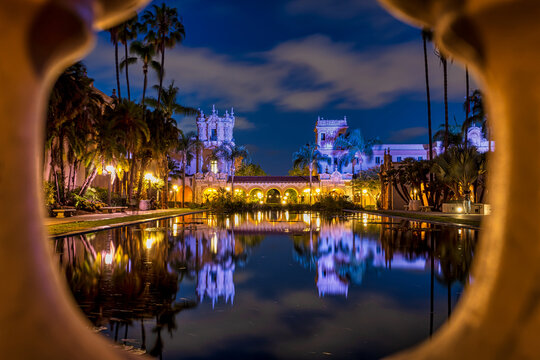 Reflection in pond of Casa de Balboa and House of Hospitality in Balboa Park taken in early evening. 