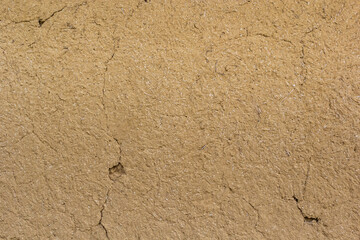 Textured background. Decorative plaster walls, external decoration of facade. Texture of beige