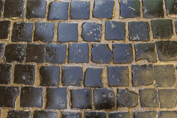 Cobblestone road. Gray cobblestone texture, vintage road surface