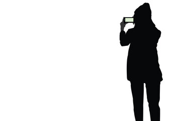 woman holds a smartphone in her hand. silhouettes 
 Isolated of people on a white background