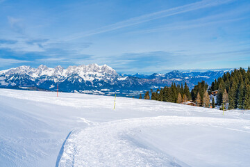Fototapeta na wymiar Wintry landscape on Hahnenkamm mountain in Austrian Alps in Kitzbuhel. Winter in Austria
