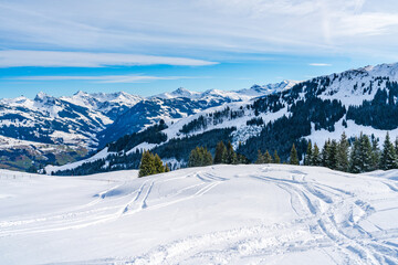 Fototapeta na wymiar Wintry landscape on Hahnenkamm mountain in Austrian Alps in Kitzbuhel. Winter in Austria