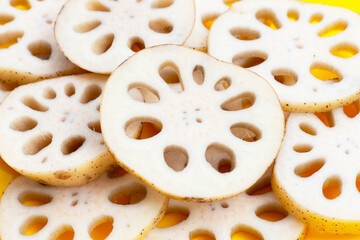 Lotus root on yellow background