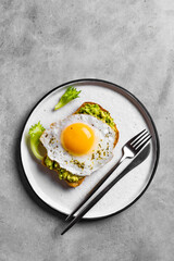 Avocado toast with fried egg