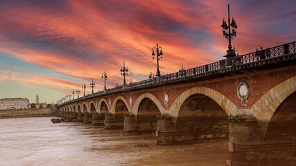 Landscape View of the Pont de pierre with sunset sky scene which The Pont de pierre crossing Garonne river