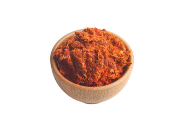 Chili peppers in wooden cup on white background