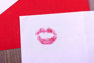Valentine's day background. Love letter sealed with a kiss.