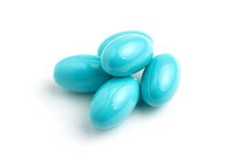 Blue capsules, vitamin pills isolated on white background, healthcare and medicine concept