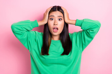 Portrait of impressed girl hands touch head open mouth cant believe isolated on pink color...
