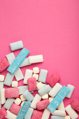 Different chewing gums on yellow background. Space for text. Vertical photo