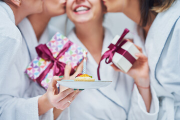Picture of four girls in bathrobe having spa birthday party