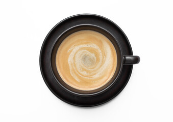 Large black creamy coffee in porcelain cup with saucer on white background. Top view.