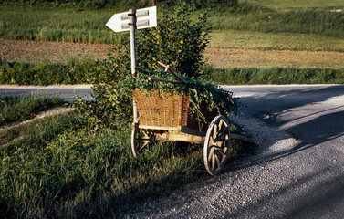 Old cart with grass countryside in Joegoslavia. Slovenia. 1984