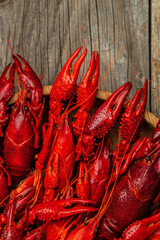 Lobster closeup. Red crayfish on a wooden background. Beer brewery concept. Snack for beer. place for text, top view