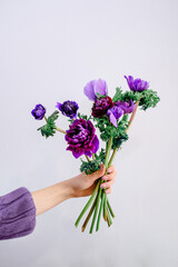 Small business flower shop florist hands with a bouquet