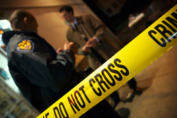 Caution tape at a crime scene.