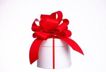 Gift box spinning with red bow