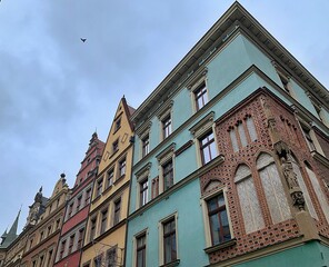 Obraz premium architecture, old historic tenement houses, Wroclaw, details on the facade, architectural works, buildings in the city