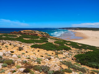 wild Praia da Bordeira beach at the west Algarve coast of Portugal