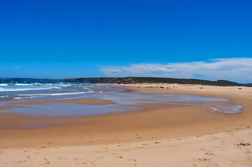 wild Praia da Bordeira beach at the west Algarve coast of Portugal
