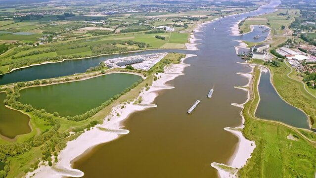 drone shot of the river Maas with floodplain