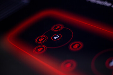 Digital black screen glows with red numbers