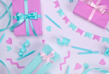  white background with candles, gift boxes, serpentine and holiday decorations in blue and lilac...