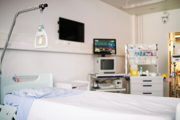 Blurred hospital background with medical bed