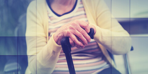 Old woman with her hands on a cane, geometric pattern