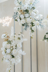 white wedding arch for the ceremony 