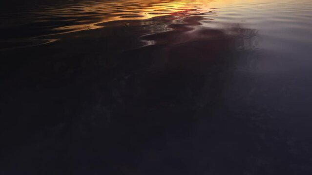 Surface of the water, glare from the Sun. Sunset or sunrise at sea. No horizon lines. Ultra HD 4K video.