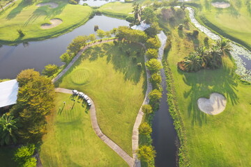Aerial view Green Golf course in the morning.