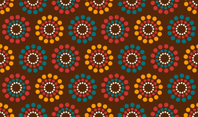 Mid century modern seamless pattern with circles of dots in brown, orange, red and turquoise. 60s and 70s aesthetic style for home decor, textile, wallpaper and wrapping paper