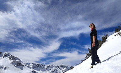Naklejka na ściany i meble Young woman in winter Tatra mountains